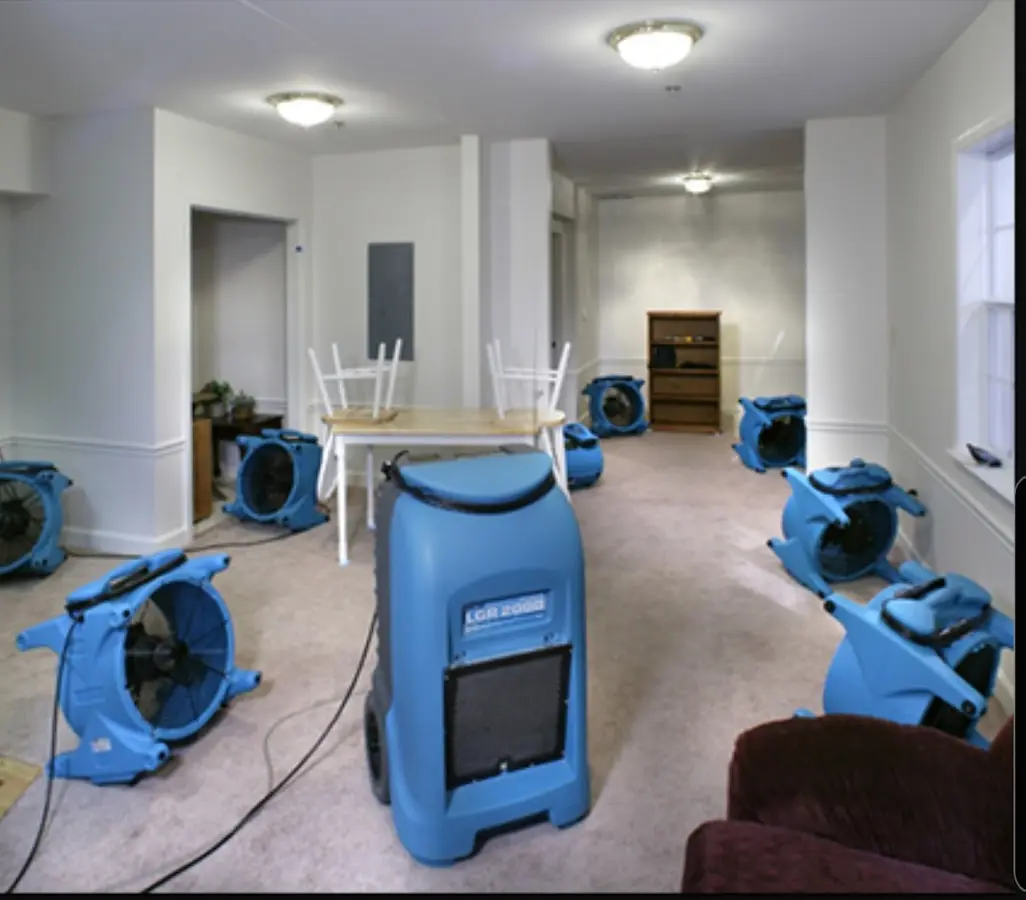 Air movers and dehumidifier setup for Water Damage Restoration in Bangor